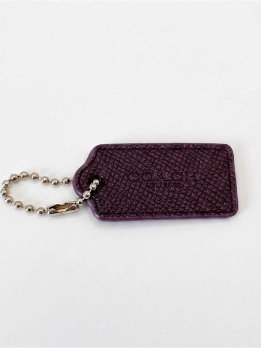 Coach Deep Purple Textured Leather Hang Tag